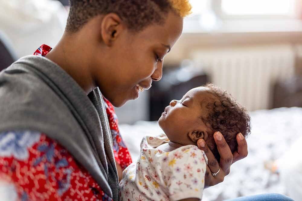 Person looking at a baby